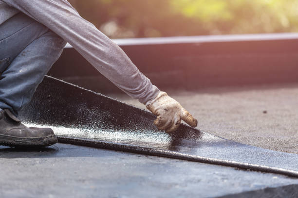 Professional Emergency Waterproofing technician working in Raymond, KS